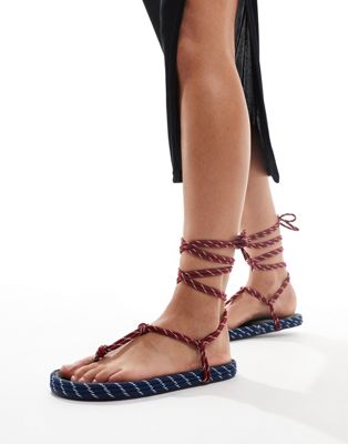 ASOS DESIGN Fillipa rope-tie flat sandals in red and navy ASOS DESIGN