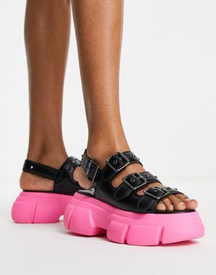 Черные массивные сандалии на розовой подошве KOI Sticky Secrets Koi Footwear