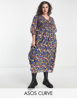 Черное свободное платье миди с присборенными манжетами ASOS DESIGN Curve с разноцветным цветочным принтом ASOS Curve