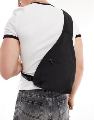 ASOS DESIGN sling bag with front pocket in black ASOS DESIGN
