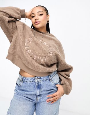 ASOS Weekend Collective oversized sweatshirt with large back logo in black