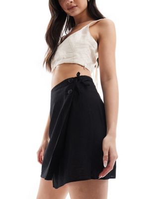 Monki linen mix wrap tie detail mini skirt in black Monki