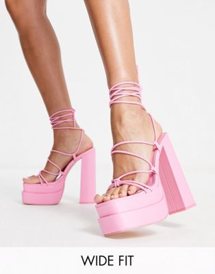 Public Desire Wide Fit Glow Girl platform heeled sandals in pink Public Desire Wide Fit