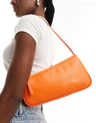 ASOS DESIGN asymmetric buckle shoulder bag in orange ASOS DESIGN