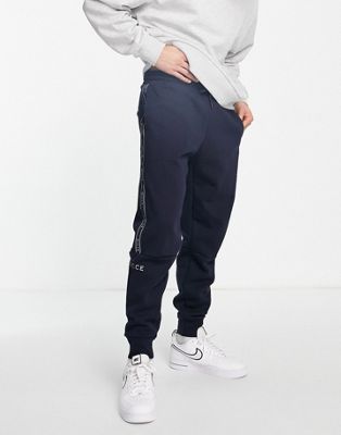 Nicce pulse taping sweatpants in navy Nicce