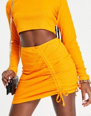 The Couture Club ribbed ruched detail mini skirt in orange - part of a set The Couture Club