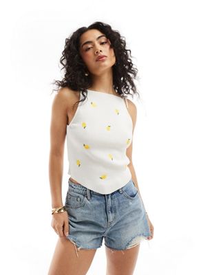 ASOS DESIGN knit cami top with tie straps in lemon embroidery pattern in cream ASOS DESIGN