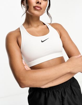 Белый спортивный бюстгальтер средней поддержки Nike Training с галочкой Nike
