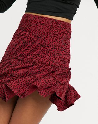 ASOS DESIGN tiered mini skirt in red and black animal print ASOS DESIGN