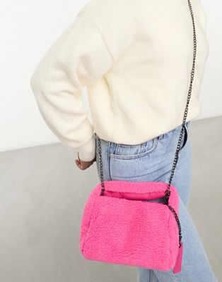 Миниатюрная сумка-саквояж с ремешком через плечо Claudia Canova из розового искусственного меха Claudia Canova