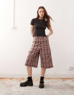 COLLUSION baggy longline shorts in pink check Collusion