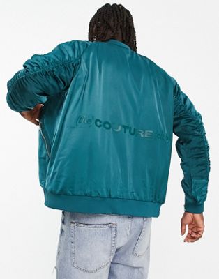 The Couture Club satin bomber jacket in teal blue with ruched sleeve detail The Couture Club