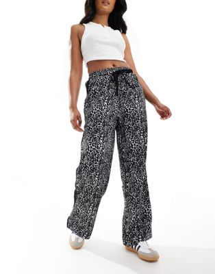 ASOS DESIGN pull on pants with contrast panel in black and white animal print ASOS DESIGN