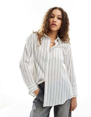 Reclaimed Vintage multi-way asymmetric wrap shirt in black and white pinstripe Reclaimed Vintage