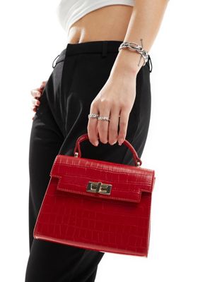 ASOS DESIGN top handle crossbody bag with twist lock in red ASOS DESIGN