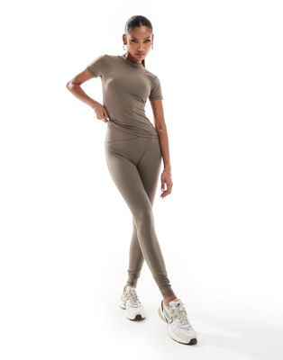 The Couture Club emblem soft touch leggings in brown The Couture Club