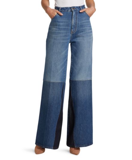 Расклешенные джинсы в технике пэчворк Victoria Beckham