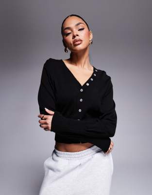 ASOS DESIGN cinched waist knit cardigan with faux shell buttons in black Asos Design