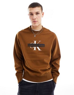 Коричневый свитшот с круглым вырезом и трафаретным логотипом Calvin Klein Jeans Calvin Klein