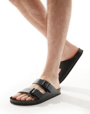 ASOS DESIGN two strap sandals in black with black sole 	 ASOS DESIGN