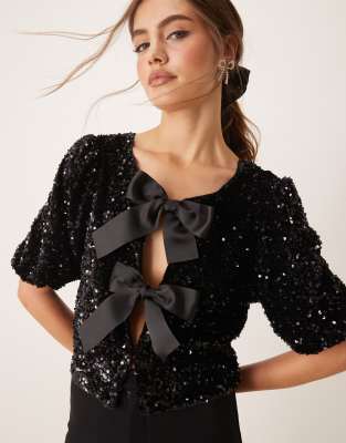 Gina Tricot sequin short sleeve top with satin bow front in black Gina Tricot