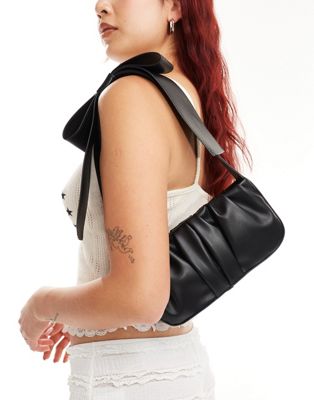 ASOS DESIGN ruched shoulder bag with large bow strap in black ASOS DESIGN