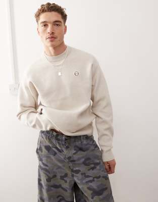 Aape By A Bathing Ape Now knitted sweater in beige  Aape By A Bathing Ape®