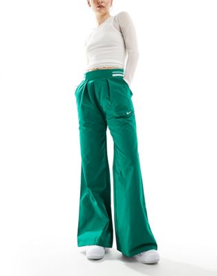 Nike Collection woven wide leg pants in green Nike