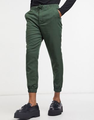 Зеленые зауженные брюки ASOS DESIGN ASOS DESIGN