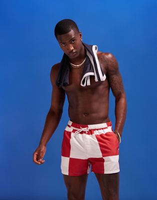 ASOS DESIGN swim shorts in short length with all over patchwork ASOS DESIGN