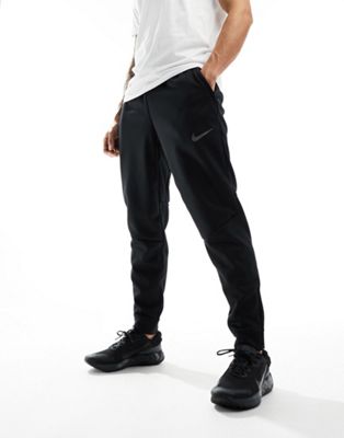Тренировочные штаны Nike Therma-FIT в черном цвете для мужчин Nike
