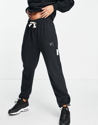 Nike Basketball Dri-FIT Standard Issue cuffed fleece sweatpants in black Nike Basketball