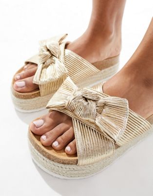 ASOS DESIGN Thankful bow detail flatform sandals in gold ASOS DESIGN