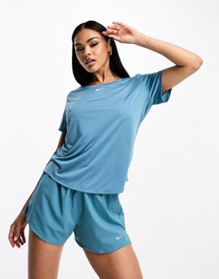  Женская спортивная футболка Nike из Dri-FIT ткани в синем цвете Nike