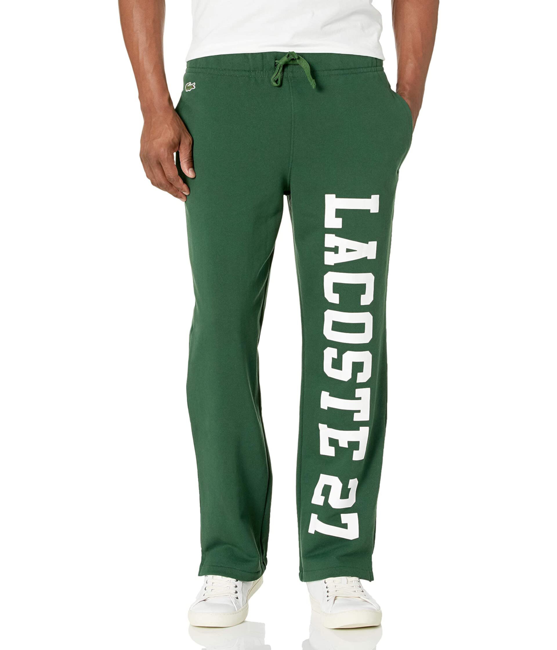 Спортивные штаны с надписью на нижнем белье с рисунком Lacoste