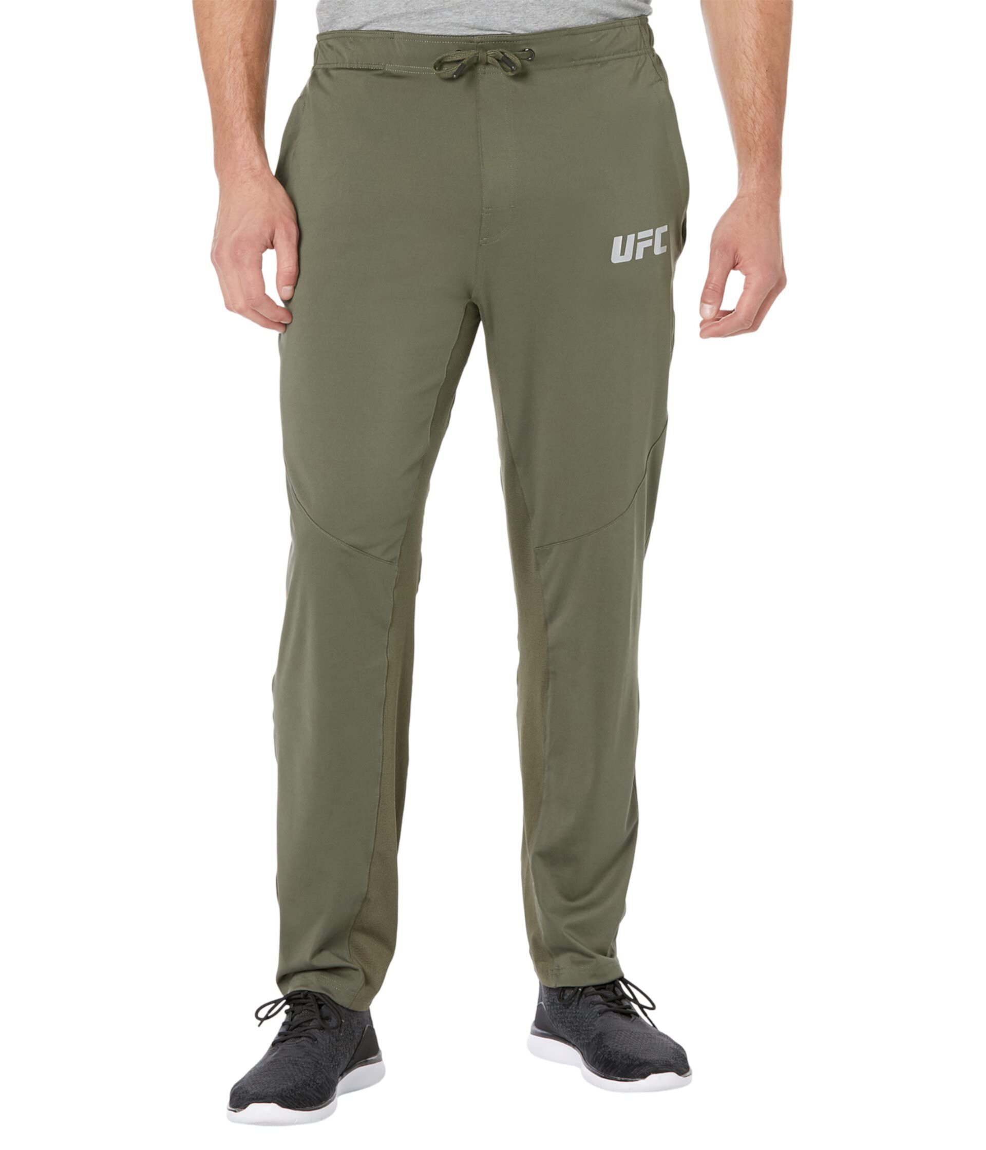 Удобные спортивные брюки UFC® с эластичным поясом и облегающим кроем slim fit, идеально подходящие для активных тренировок Ufc