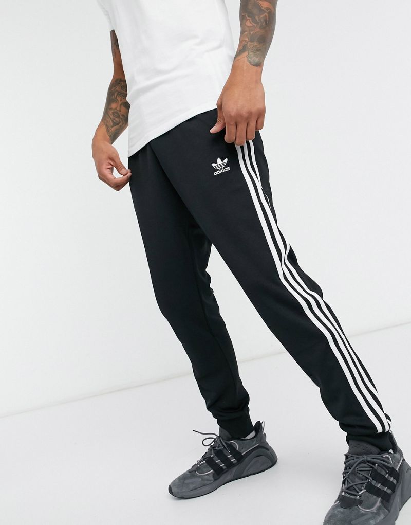 Adidas originals adicolor three stripe body in hot sale black