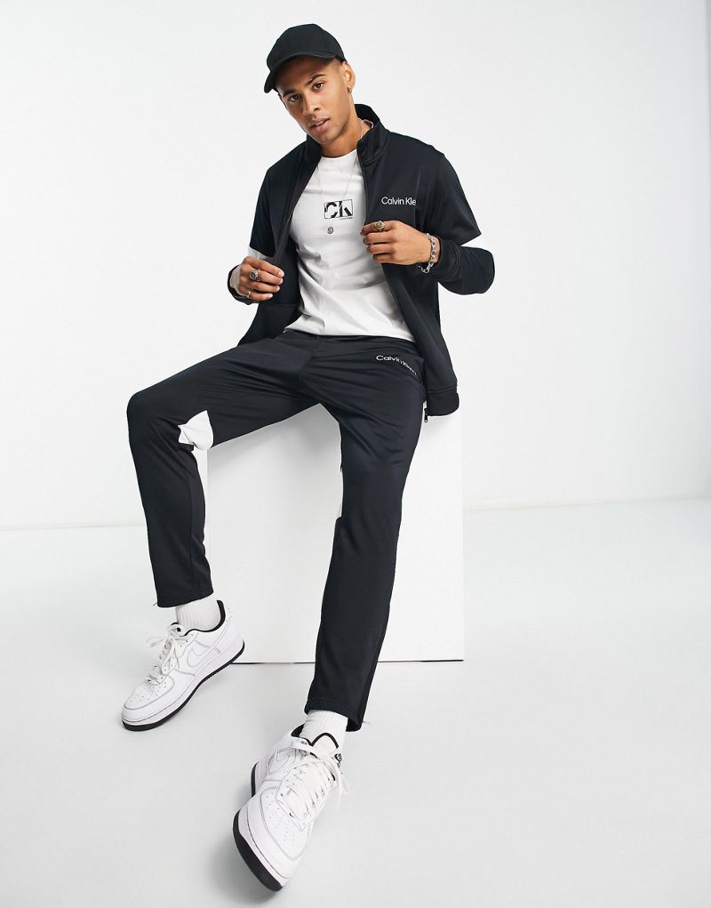 Черный спортивный костюм в стиле колор-блок Calvin Klein Performance Calvin Klein