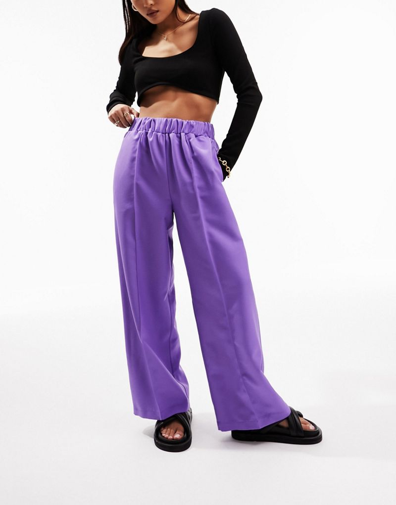  Укороченные брюки с эластичным поясом в цвете пурпур от ASOS DESIGN для женщин, категория - повседневные брюки ASOS Petite