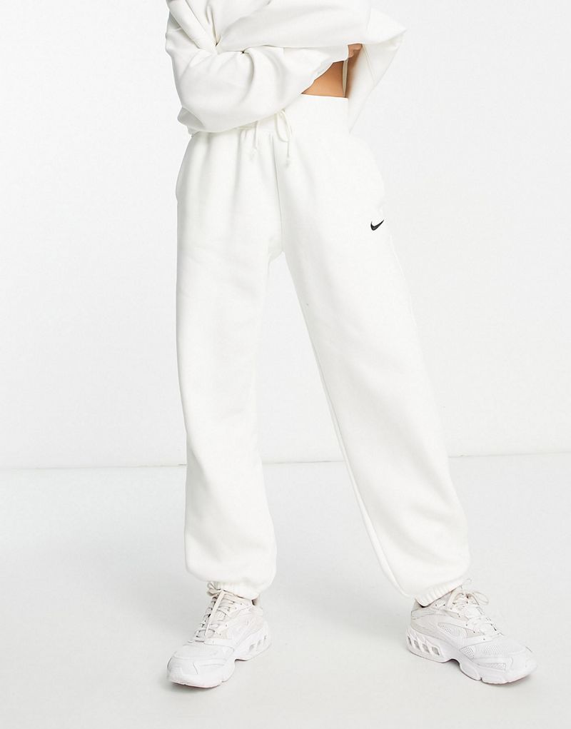 Белые спортивные штаны Nike Phoenix Fleece для мужчин Nike