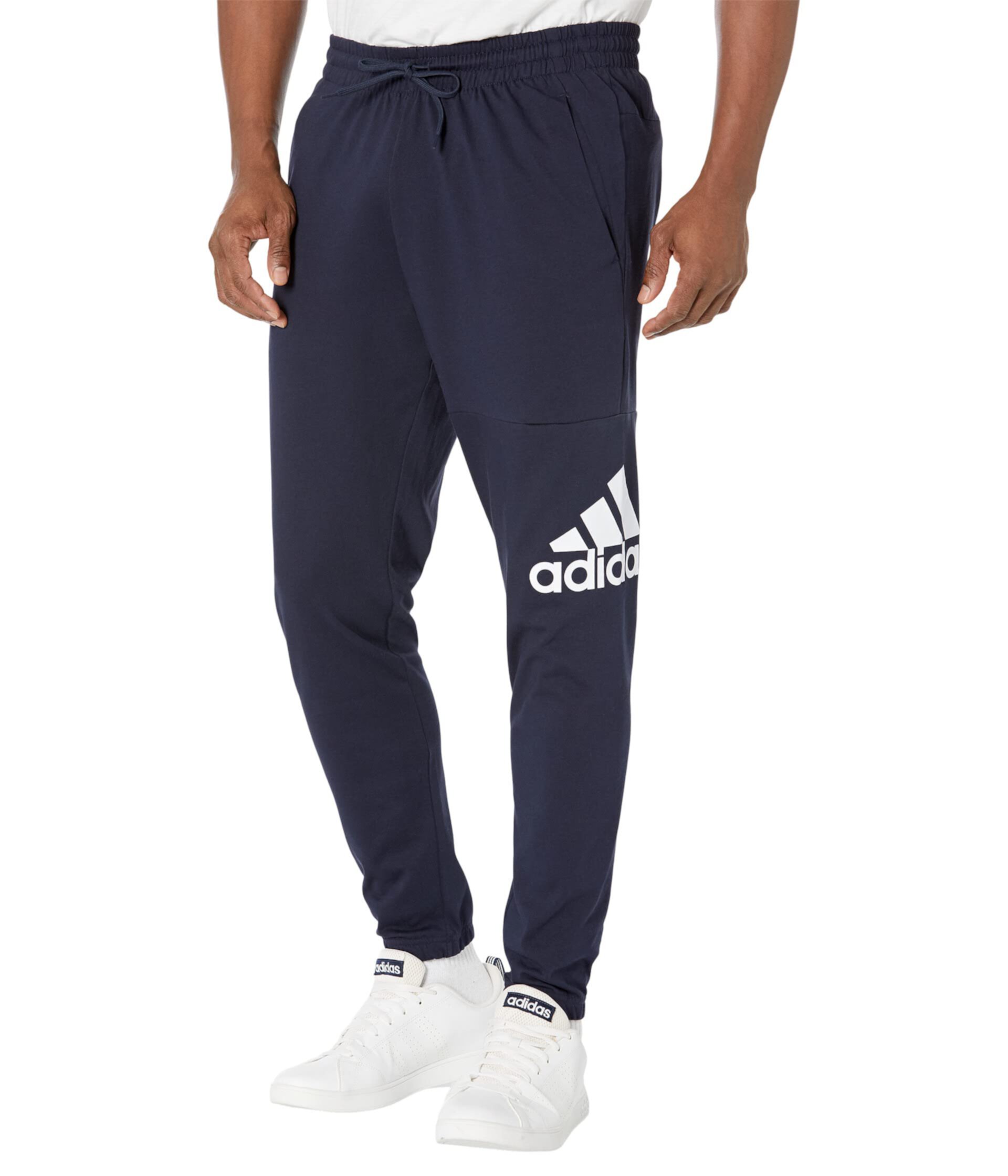 Комфортные и стильные штаны из однослойной ткани adidas Essentials с карманами, 70% хлопка Adidas