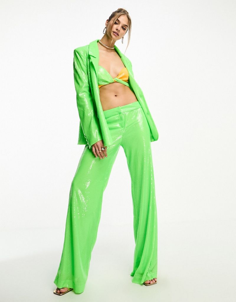 Ярко-зеленые костюмные брюки с напуском и пайетками Annorlunda Annorlunda
