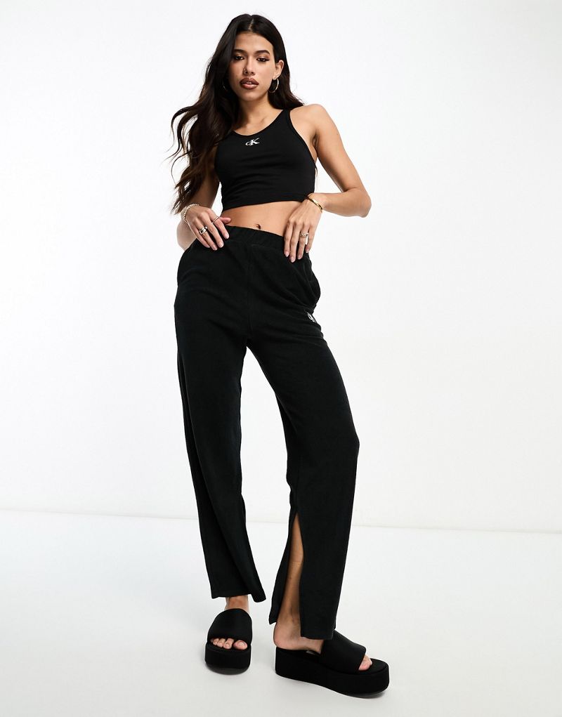 Черные пляжные брюки с завышенной талией и монограммой Calvin Klein Calvin Klein