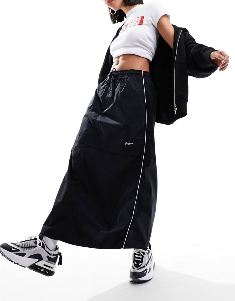  Женские костюмные штаны Nike Streetwear с вшитой юбкой-парашютом черного цвета Nike