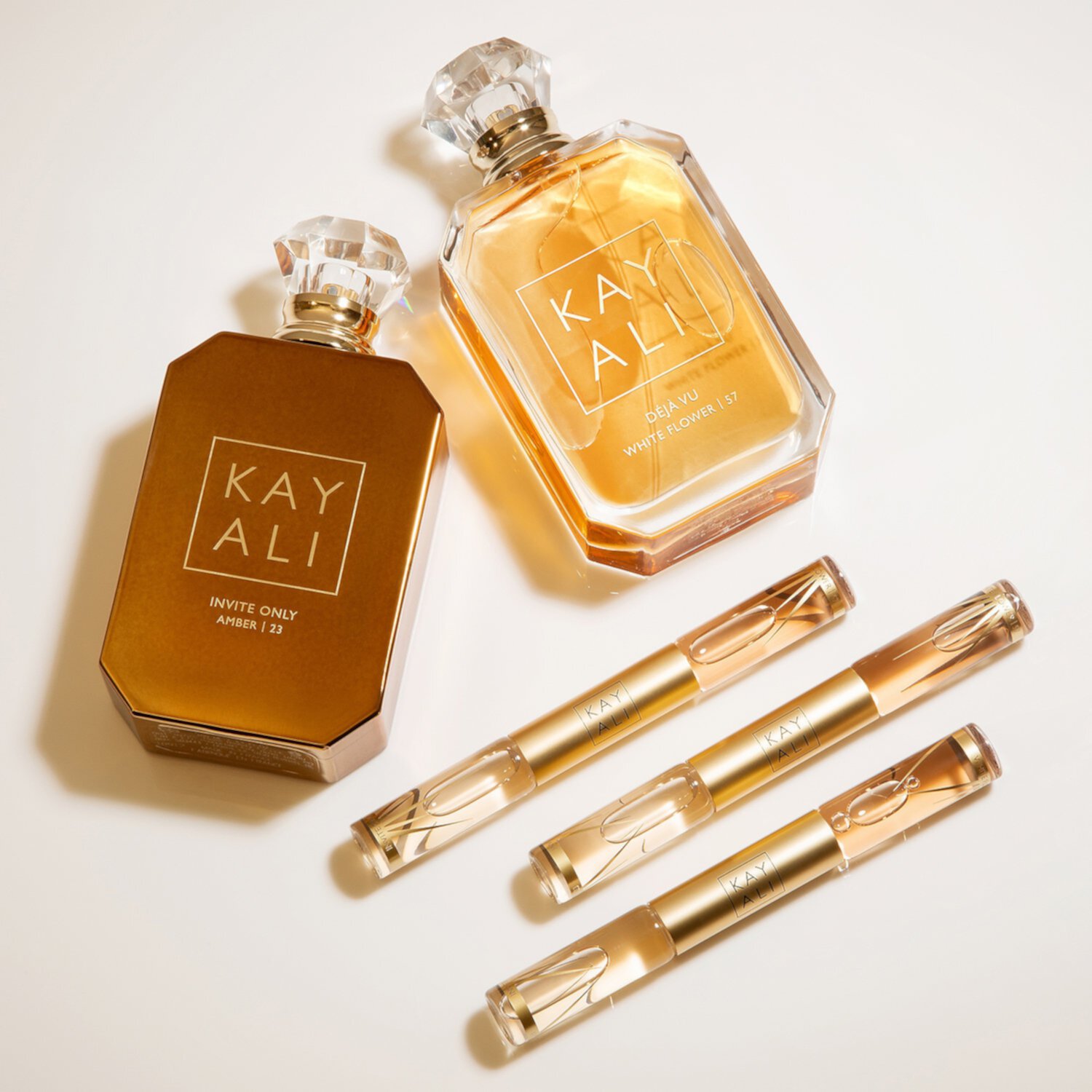 INVITE ONLY AMBER | 23 & DÉJÀ VU WHITE FLOWER | 57 Double Rollerball KAYALI