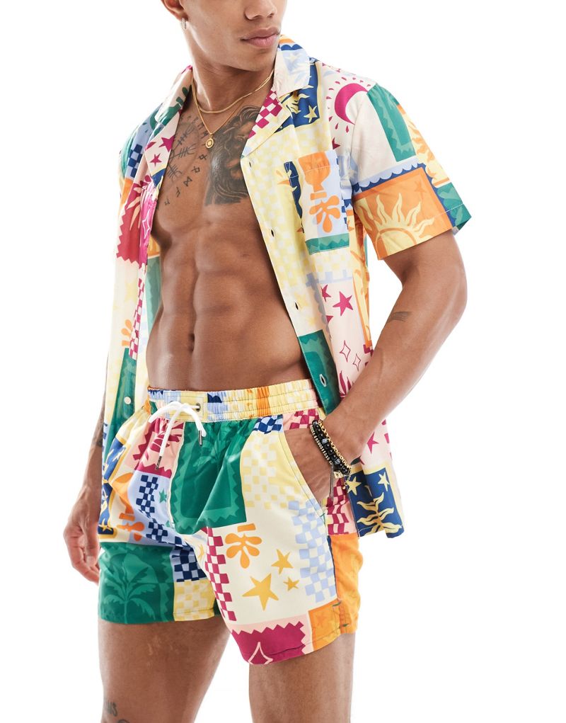 Another Influence swim shorts in postcard print Another Influence