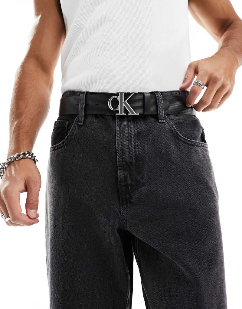 Ремень Calvin Klein Jeans круглая монотабличка 40 мм кожаный черный Calvin Klein