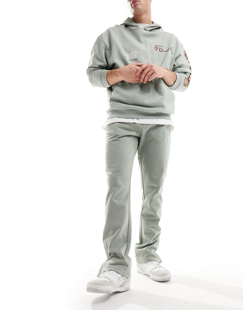 The Couture Club emblem sweatpants in khaki The Couture Club