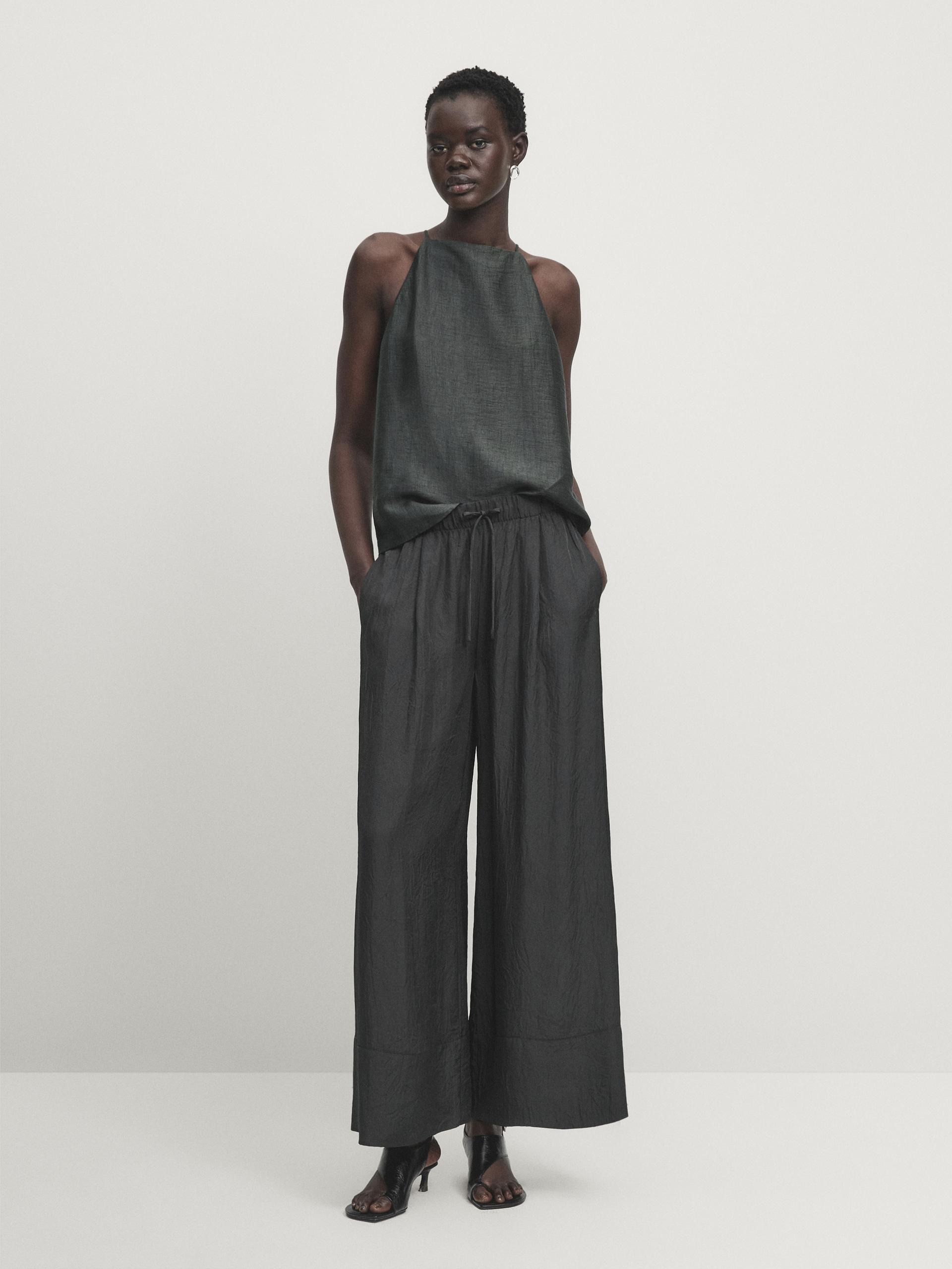 Satin trousers with elasticated waistband and double hems ZARA