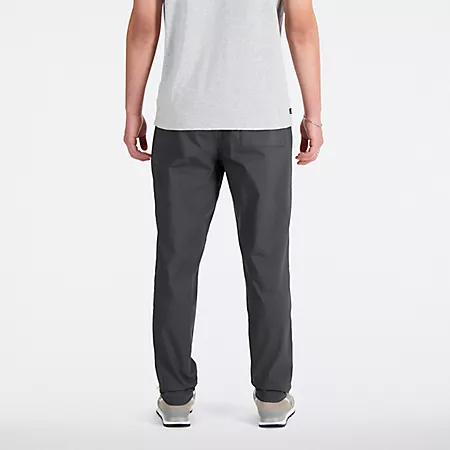 Мужские Спортивные брюки New Balance Athletics Linear Woven Pant New Balance